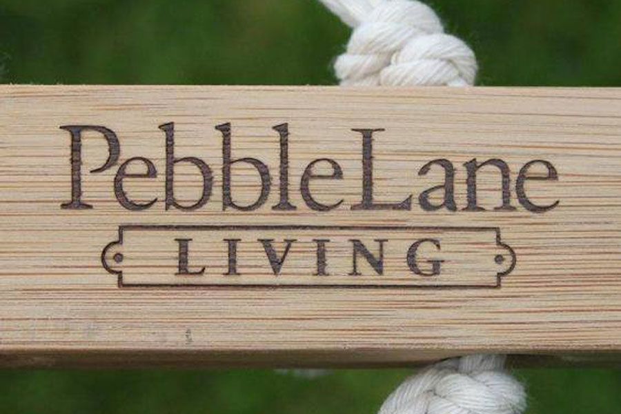 Pebble Lane Living logo engraved on hammock
